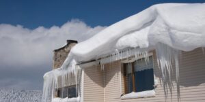 A home exterior that has ice dam water damage